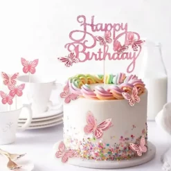 Set Topper Tort Happy Birthday Roz Glitter Cu Fluturi Decorativi Pe Un Tort Alb