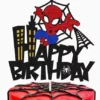 Topper pentru tort Spiderman Happy Birthday cu sclipici, panza de paianjen si silueta unui oras.